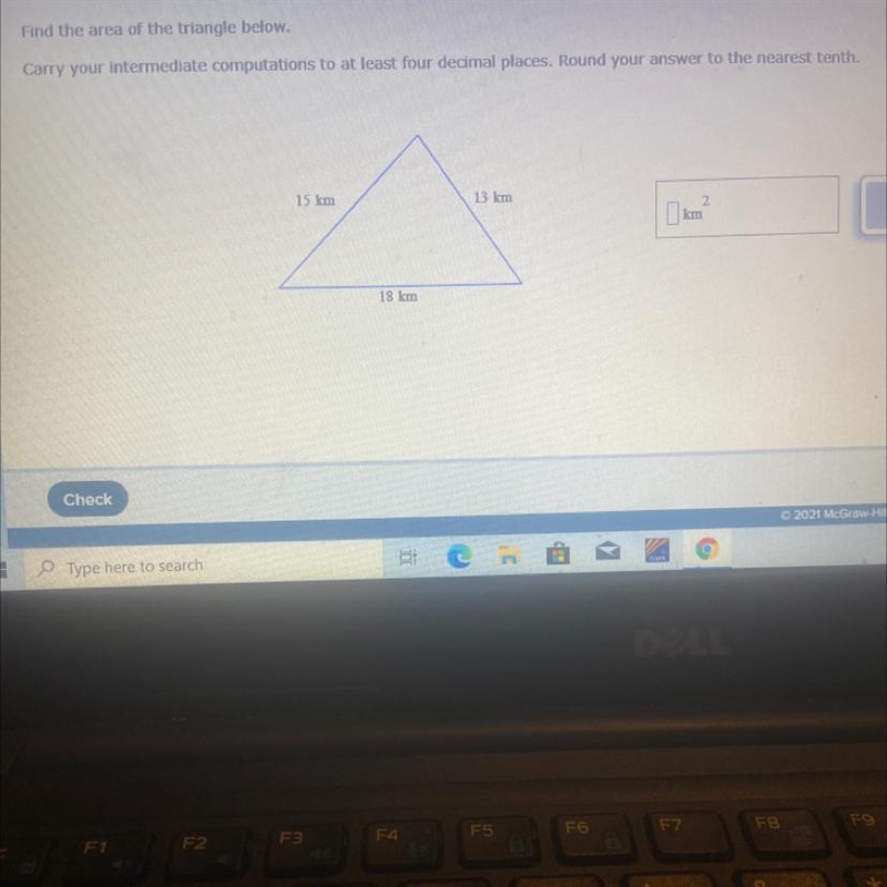 Find the area of the triangle below.Carry your intermediate computations to at least-example-1