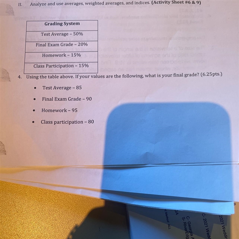 Using the table above. If your values are the following, what is your final grade-example-1