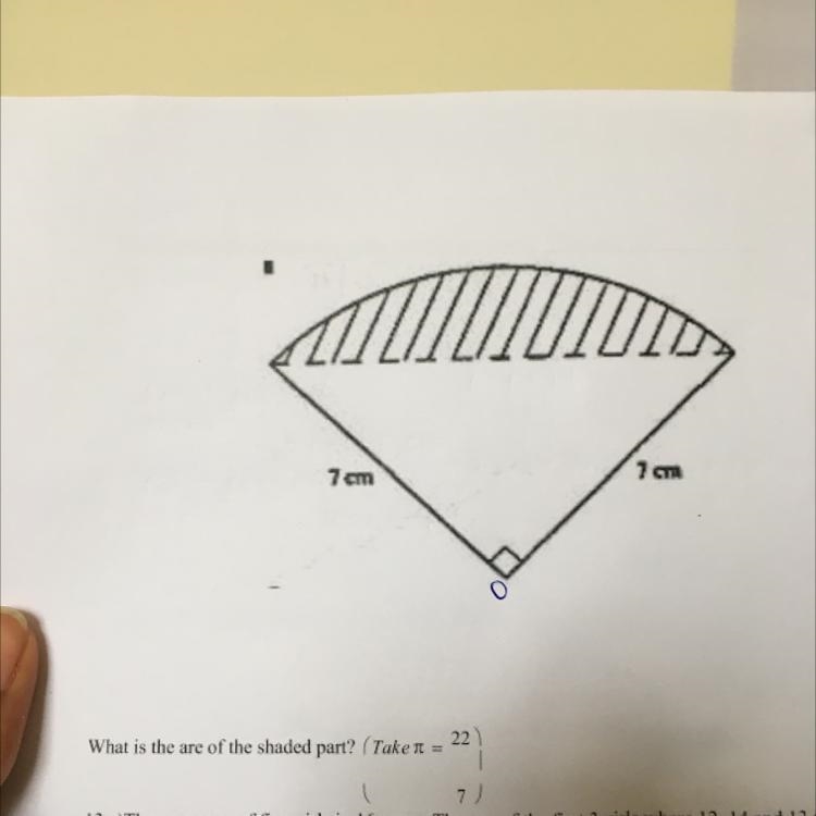 A quarter of a circle has a radius of 7cm. What is is the area of the shaded part-example-1