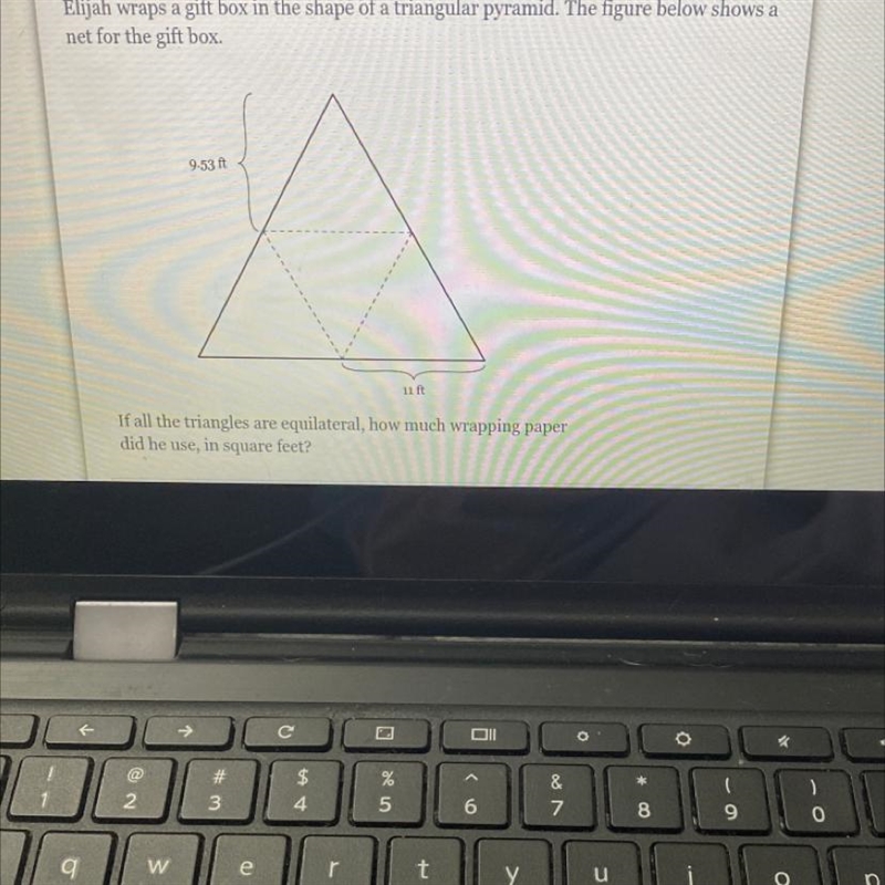 Elijah wraps a gift box in the shape of a triangular pyramid. The figure below shows-example-1