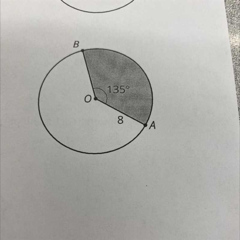 6. Find the area of the shaded region of the circle. The radius is given in inches-example-1