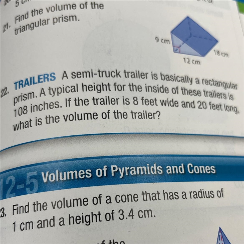 22.TRAILERS A semi-truck traler is basially a rectangular prism. A typical height-example-1