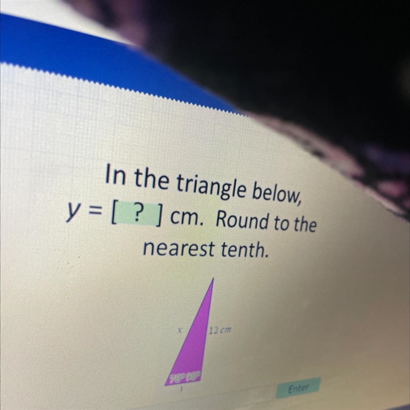 In the triangle below, y = [ ? ) cm. Round to the nearest tenth.-example-1