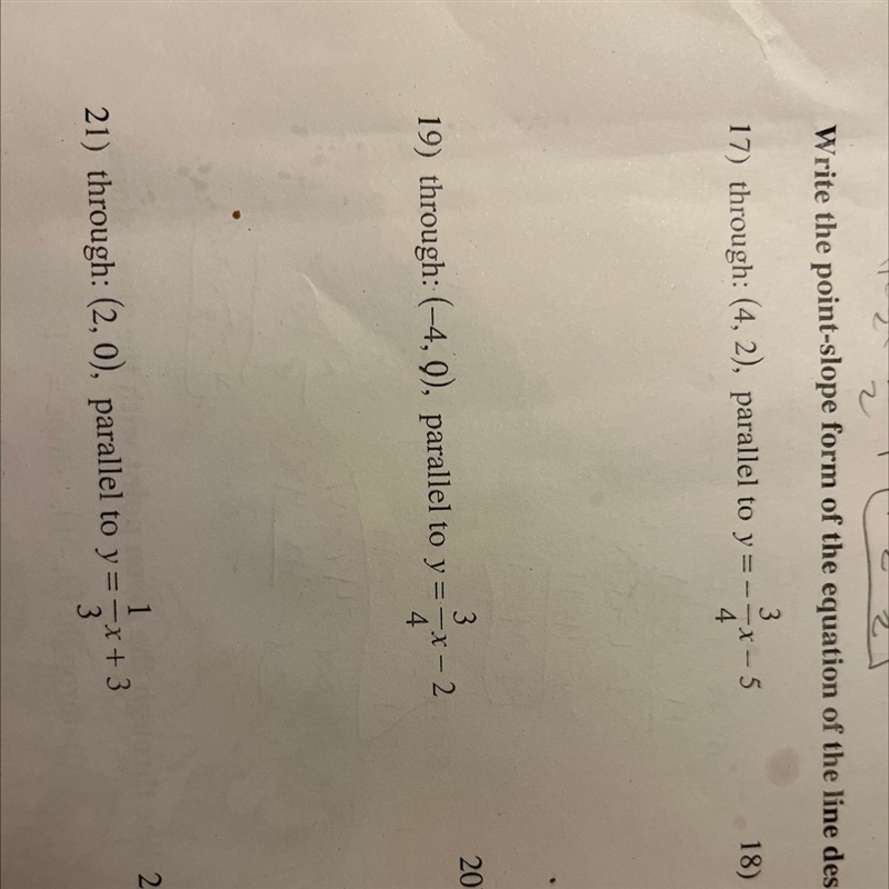 Write the point slope form of the equation of the line described question 17-example-1