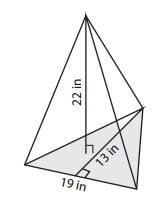 Find the volume of the triangular pyramid to the nearest whole number.-example-1