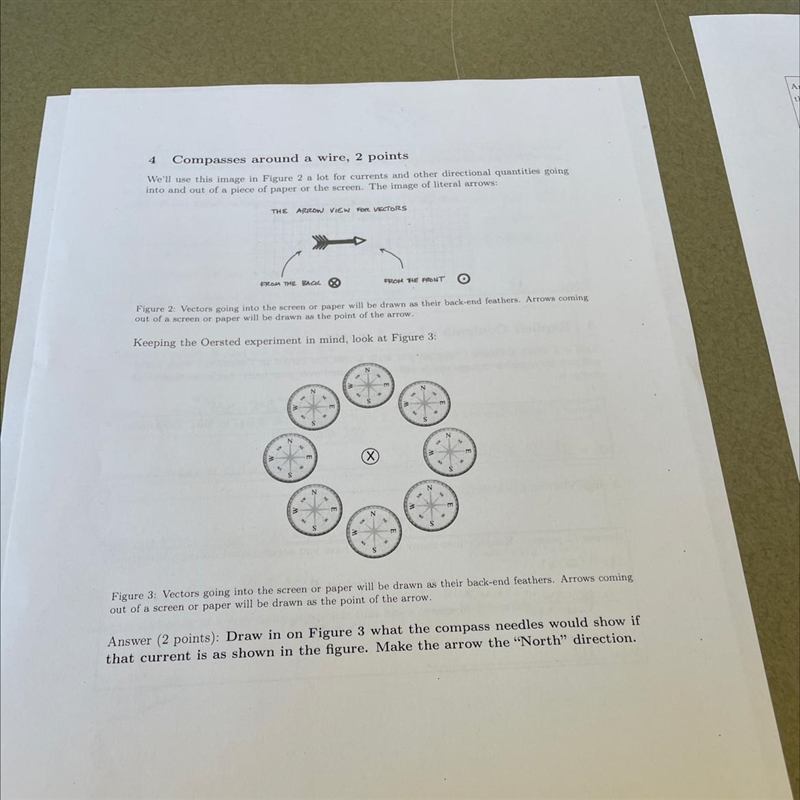 Draw In figure what the compass needles would show if that current is as shown in-example-1