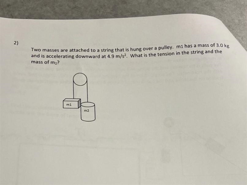 Two masses are attached to a string that is hung over a pulley. m1 has a mass of 3.0 kgand-example-1